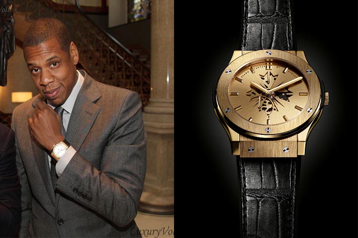 Jay-Z wearing his custom diamond Hublot Big Bang chronograph with baguette-cut diamonds and white gold case, photographed courtside, showcasing luxury iced-out watches and hip-hop watch culture.