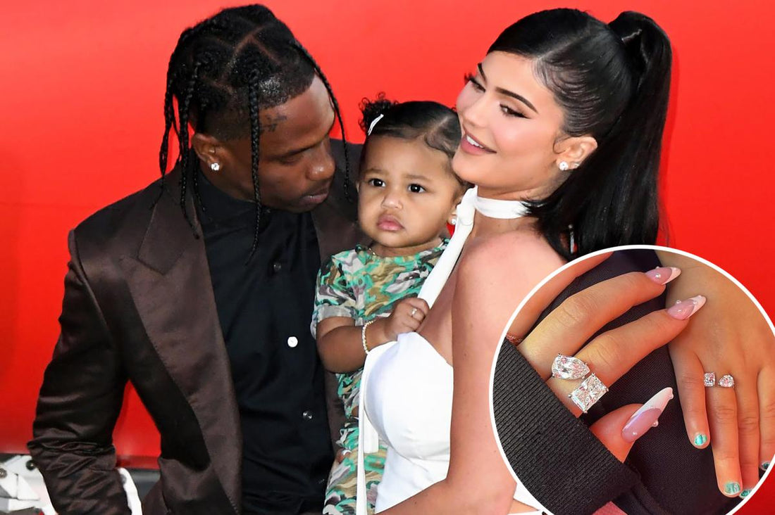 Kylie Jenner wearing a pear-shaped diamond double band ring in white gold, with hidden halo setting, sparking modern bridal trends and viral engagement speculation.