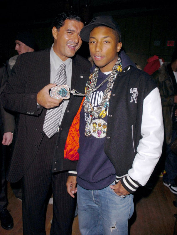 Pharrell Williams wearing Jacob & Co.’s diamond brain chain, a custom 18k gold pendant encrusted with over 1,600 white and yellow diamonds.