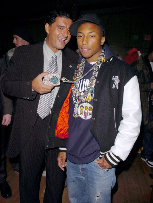 Pharrell Williams wearing Jacob & Co.’s diamond brain chain, a custom 18k gold pendant encrusted with over 1,600 white and yellow diamonds.
