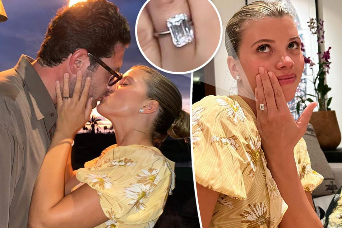Sofia Richie wearing a custom emerald-cut diamond engagement ring with a yellow gold solitaire band, setting minimalist bridal jewelry trends.