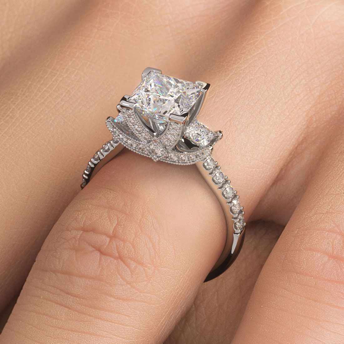 Close-up of princess cut three stone engagement ring in 18k white gold, 1.05 carats – premium setting by Global Sky Diamonds, New York City.