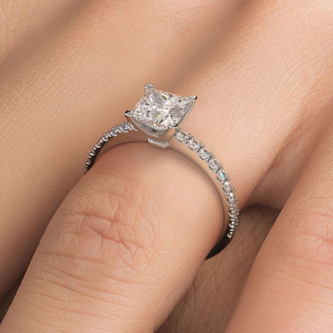 Princess cut diamond engagement ring in 18k white gold with petite micro prong setting, worn on hand — perfect for classic and modern brides. Mazalito style from the Diamond District.