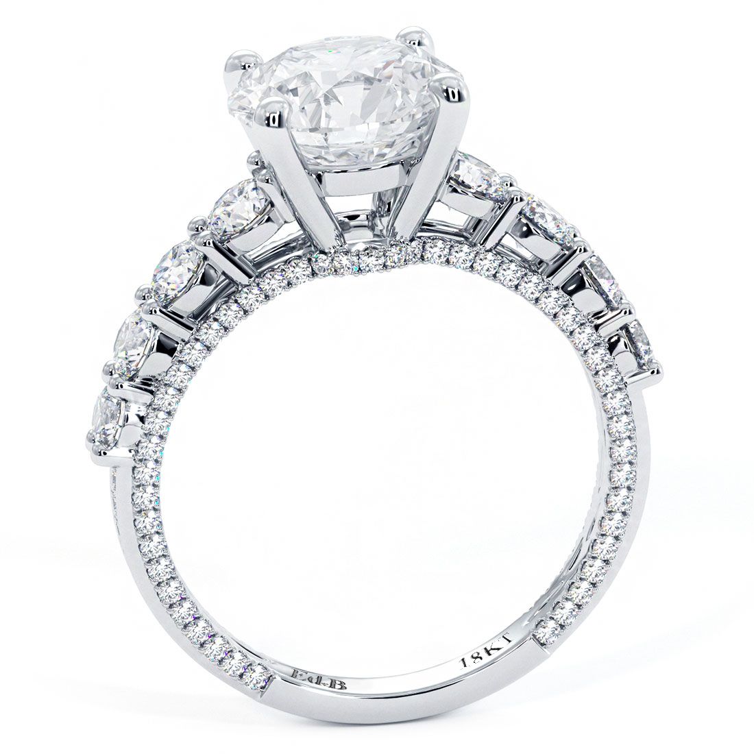 Detailed side view of engagement ring setting with delicate micropavé diamonds flowing into graduated side stones, set in high-polish 18k white gold and crafted for a 2.0ct round center stone (not included), side diamonds G color SI1 clarity, from Global Sky Diamonds, Diamond District NYC. Browse more at GlobalSkyDiamond.com.