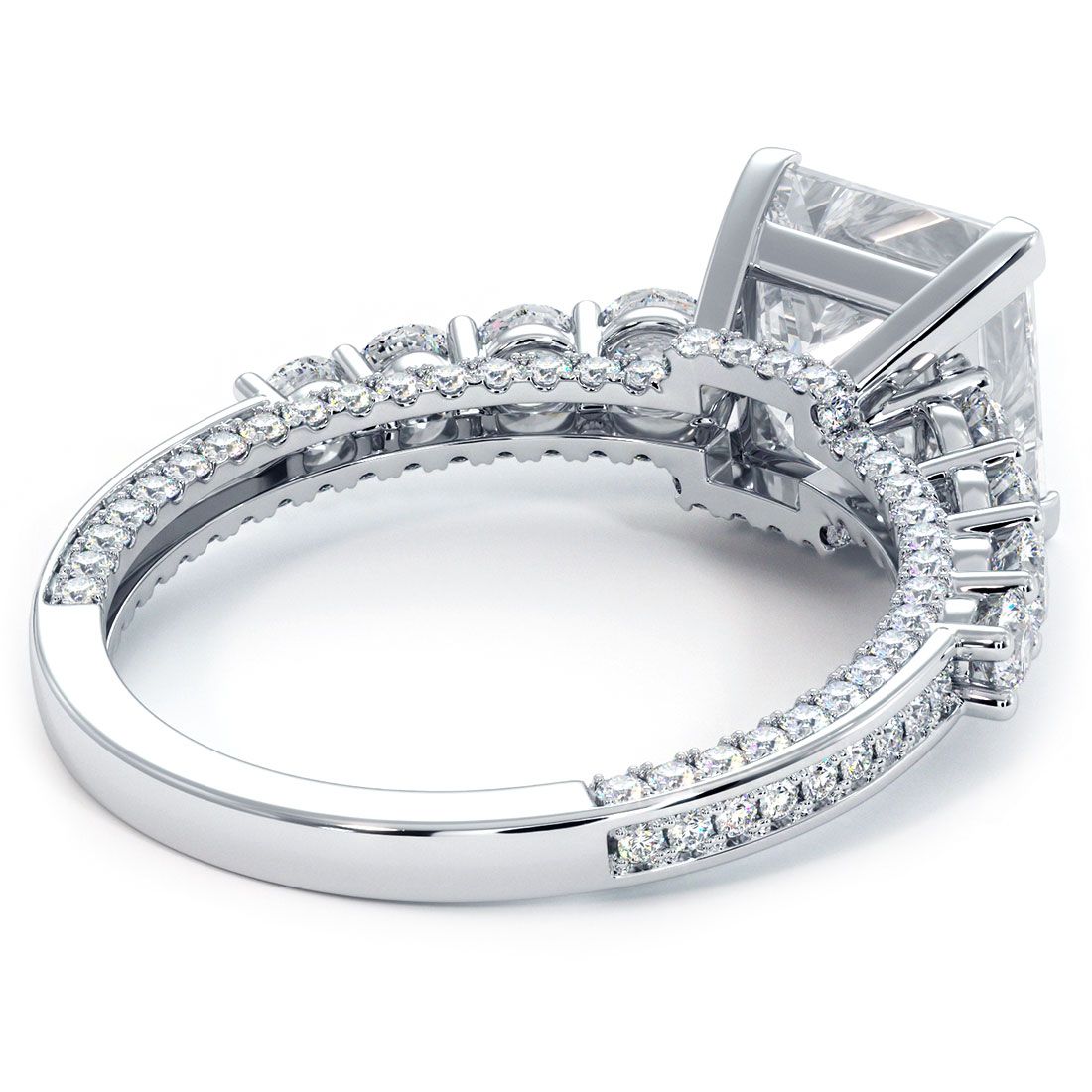 Underside view of Infinity Twist halo diamond ring in 18k white gold with 0.77ctw micropavé G SI1 side stones, featuring designer basket setting for 1.0ct round center diamond (not included), made by Global Sky Diamonds at 44W 47th St Booth GF-10, New York’s Diamond District. Learn more at GlobalSkyDiamond.com.