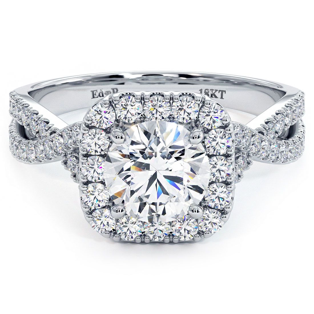 ront view of Cushion Halo Infinity Twist Diamond Engagement Ring Setting in 18k white gold by Global Sky Diamonds, handcrafted for a 1.50ct round center stone. Features 0.53ctw G color SI1 clarity round side diamonds in a cushion-shaped halo and twisted shank for maximum brilliance and elegance. From NYC’s Diamond District at 44W 47th St Booth GF-10. Shop custom engagement rings at globalskydiamond.com.