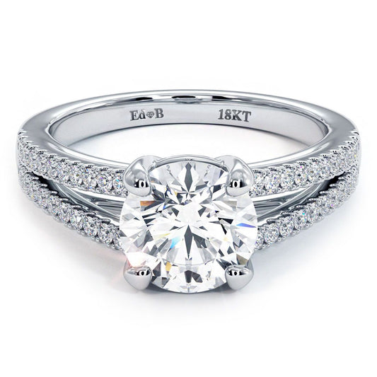 Front view of Round Brilliant Micro-Prong Split Shank Diamond Engagement Ring Setting in 18k white gold, featuring 0.31ctw of G color SI1 clarity round side stones. Designed to hold a 1.50ct round center diamond. Sparkling micro-prong diamonds enhance the split shank design. Handcrafted by Global Sky Diamonds at 44W 47th St Booth GF-10 in NYC’s Diamond District. Shop now at globalskydiamond.com.