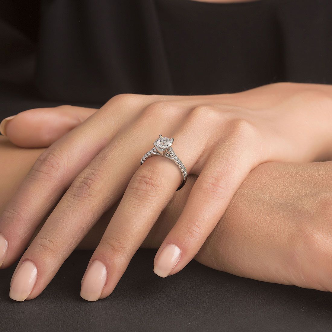Profile view of handcrafted 18k white gold engagement ring setting with round brilliant beaded prong diamond band, 0.40ctw G/SI1 side stones, designed for 1.0ct round diamond, only at Global Sky Diamonds, 44W 47th Street NYC, GlobalSkyDiamond.com