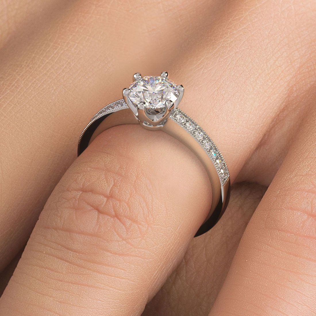 Round brilliant diamond engagement ring worn on hand, highlighting 6-prong setting and 18k white gold micropavé milgrain band with G/SI1 diamonds, photographed at Global Sky Diamonds in NYC Diamond District, 44 W 47th St Booth GF-10. Center diamond not included, fits 1ct. Find more on globalskydiamond.com