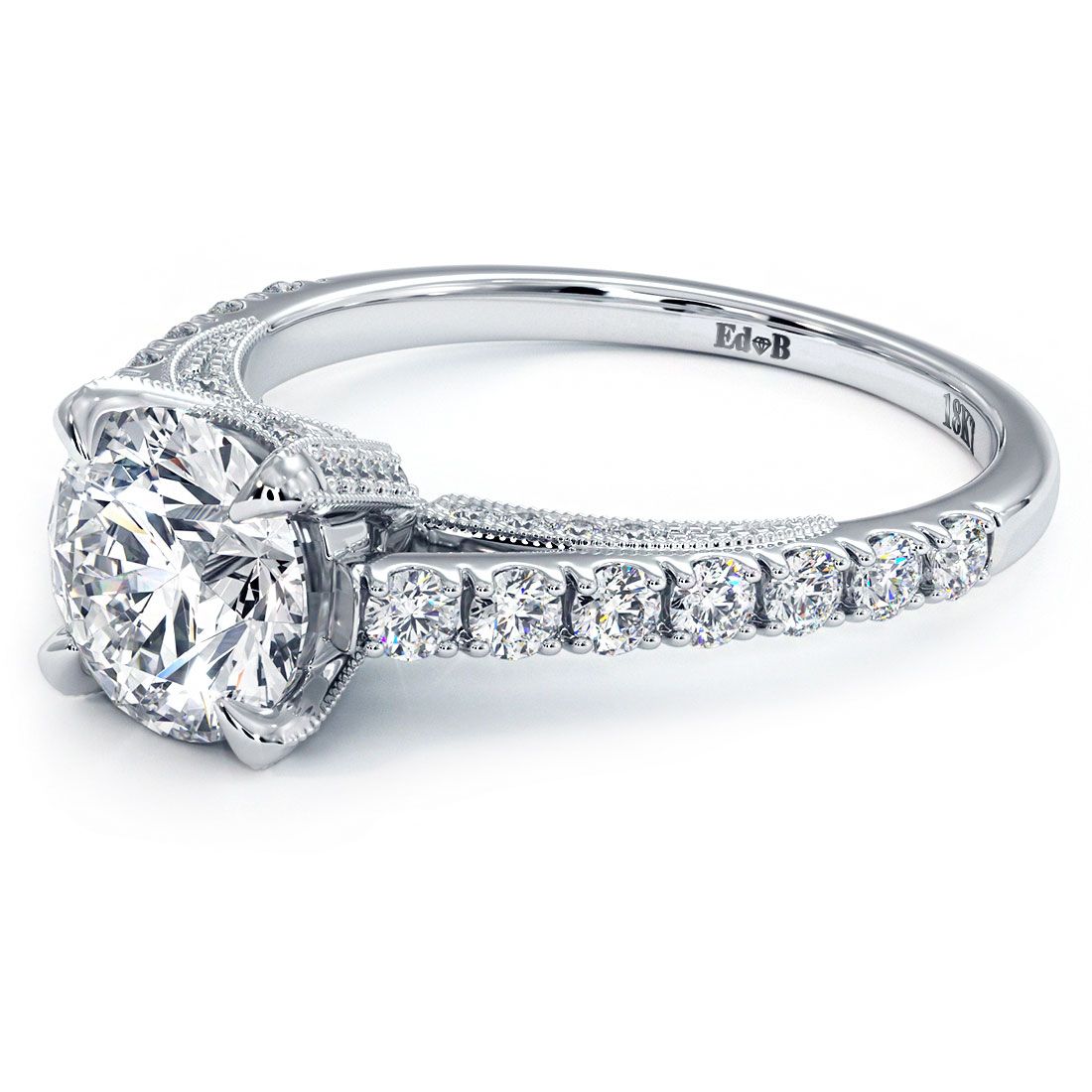 Angled front-facing view of a 0.85ctw Round Brilliant micropavé diamond engagement ring setting in 18k white gold with vintage-style milgrain and secure six-prong mount, made to hold a 1.0 carat round center stone (not included), featuring G color SI1 side diamonds, sold by Global Sky Diamonds, Diamond District NYC, 44W 47th St Booth GF-10. Visit globalskydiamond.com. Instagram @globalskydiamonds, TikTok @global.sky.diamond.