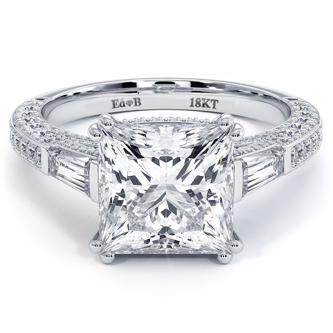 Princess cut diamond engagement ring setting with tapered baguette side stones and micropavé band, shown in high-resolution front angle. Crafted in 18KT white gold with double claw prongs, perfect for a 3.0ct center. Available from Global Sky Diamonds, Diamond District NYC, 44W 47th St Booth GF-10. globalskydiamond.com @globalskydiamonds @global.sky.diamond