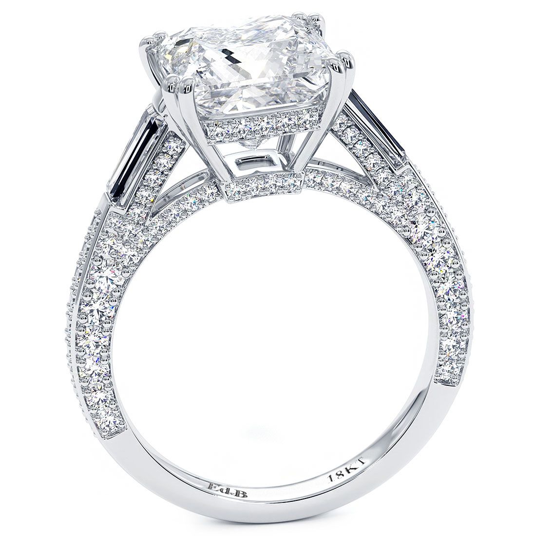 Side profile view of princess cut engagement ring setting with double claw prongs and tapered baguettes flanking a split shank pavé band. Sparkling 18KT white gold design enhances brilliance and elegance. Designed for a 3.0ct stone. Visit Global Sky Diamonds in the NYC Diamond District at 44W 47th St Booth GF-10. globalskydiamond.com @globalskydiamonds @global.sky.diamond