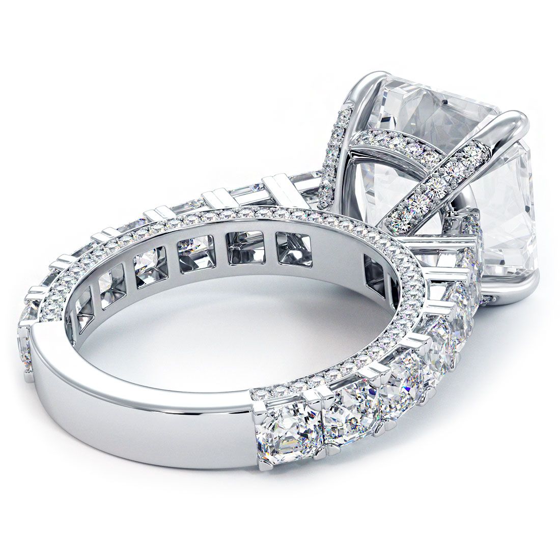 Close-up under-gallery view of Asscher cut cathedral setting. Features an intricately crafted 18K white gold band with micropavé diamonds totaling 3.50ctw, G color, SI1 clarity. Supports 7.0ct Asscher center stone. Elegant elevation and support. Global Sky Diamonds, 44W 47th St GF-10, NYC. globalskydiamond.com @globalskydiamonds @global.sky.diamond