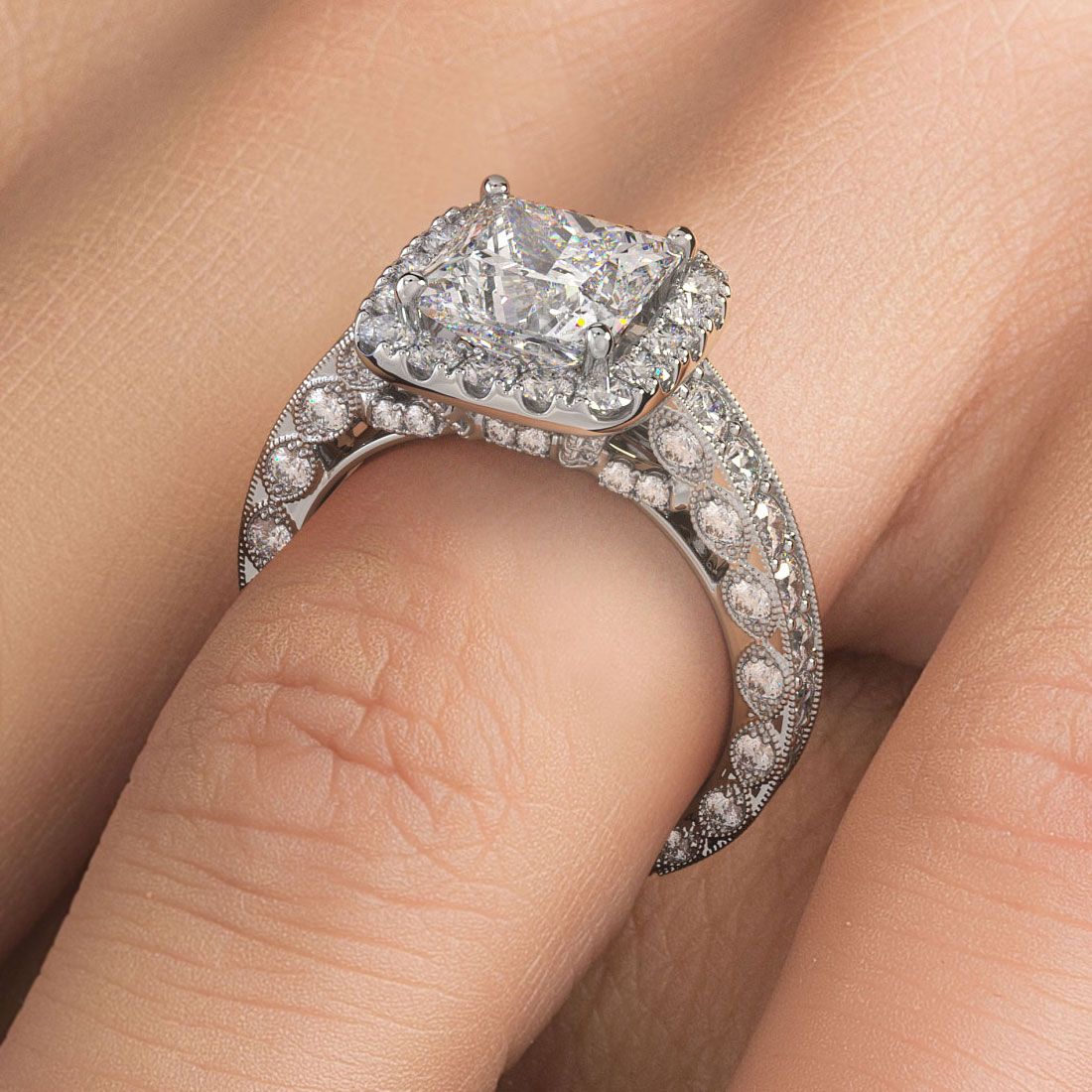 Vintage cushion halo engagement ring setting with princess cut center (not included), worn on hand. 18K white gold with detailed filigree, 1.90ctw G/SI1 side stones. Designed to hold a 3.0ct center stone. Elegant and timeless. Created by Global Sky Diamonds, Diamond District NYC, 44W 47th St GF-10. globalskydiamond.com @globalskydiamonds @global.sky.diamond