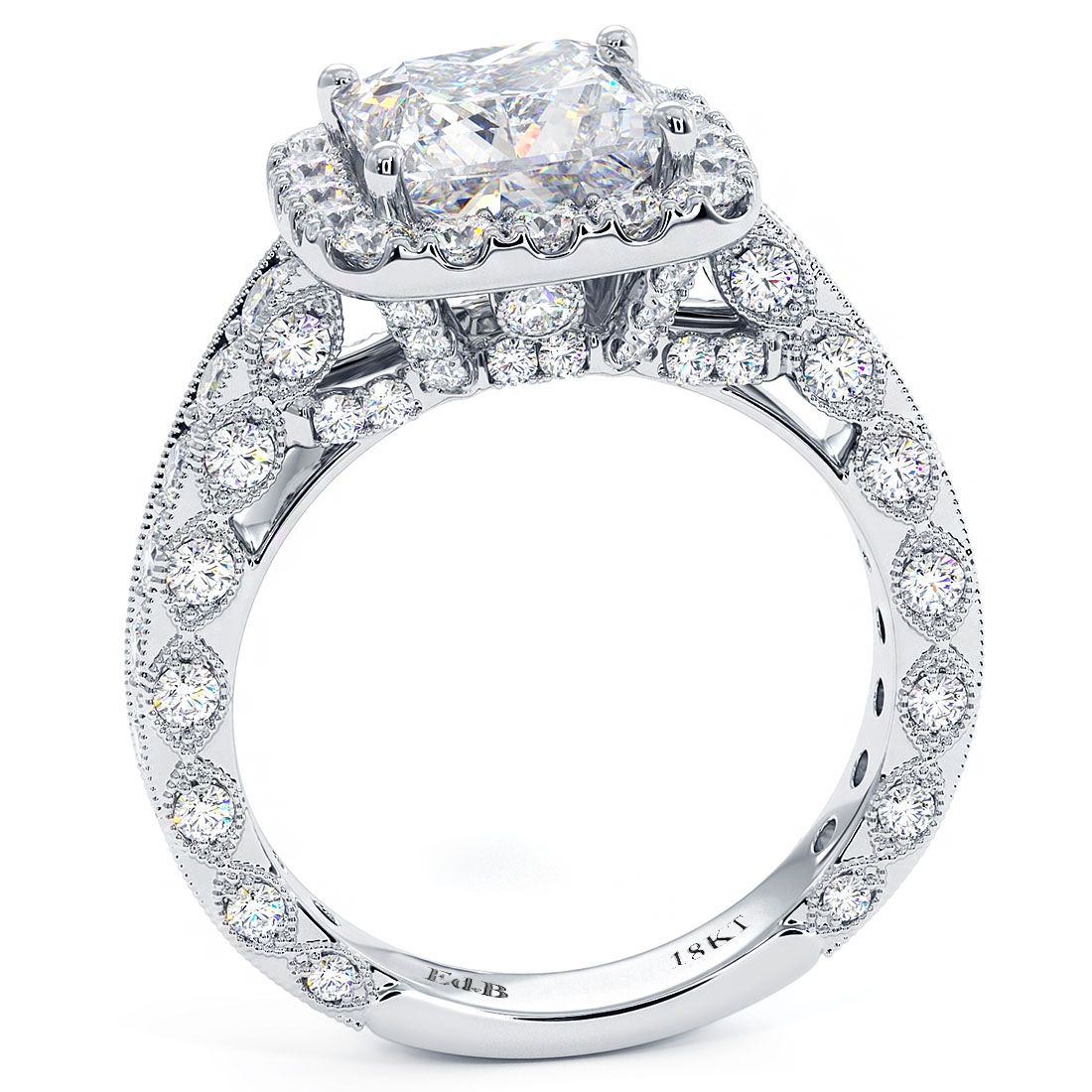 Side profile of cushion halo princess cut engagement ring setting in vintage-inspired 18K white gold. Delicate filigree gallery with milgrain and 1.90ctw of G/SI1 side stones. Designed to hold a 3.0ct princess cut center. Crafted by Global Sky Diamonds, NYC Diamond District, 44W 47th St Booth GF-10. globalskydiamond.com @globalskydiamonds @global.sky.diamond
