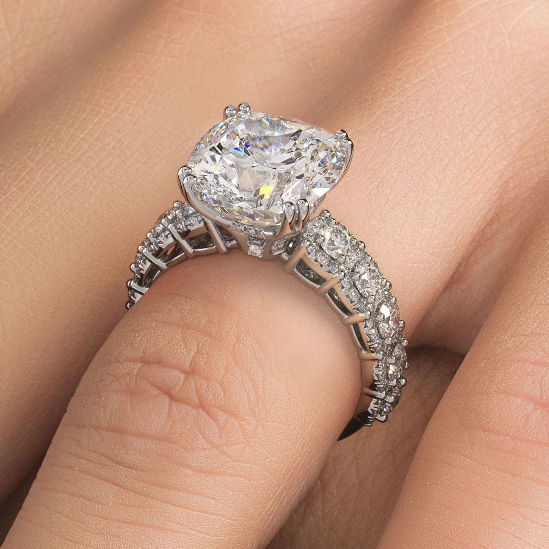 Angled view of cushion cut micropavé halo diamond engagement ring setting, showcasing intricate 18k white gold craftsmanship with 1.25ctw side diamonds, G color, SI1 clarity. Designed for a 5.0ct cushion center. Available at Global Sky Diamonds, 44W 47th St Booth GF-10, Diamond District NYC. Visit globalskydiamond.com