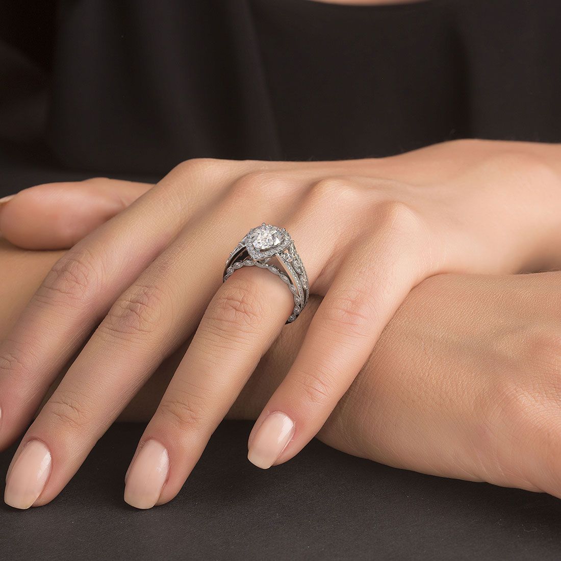 Top-down view of pear-shaped halo diamond engagement ring setting in 18k white gold, vintage-style with micropavé graduated shank by Global Sky Diamonds — globalskydiamond.com