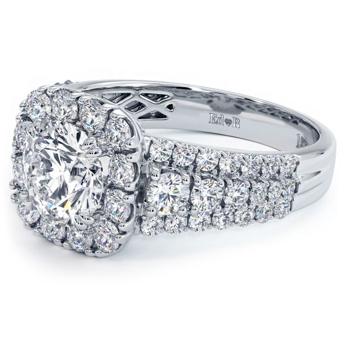 Angled photo of luxurious cushion halo engagement ring with round center mount, featuring micropavé graduated band in white gold, 2.65ctw accent diamonds – Find it at Global Sky Diamonds, www.GlobalSkyDiamond.com