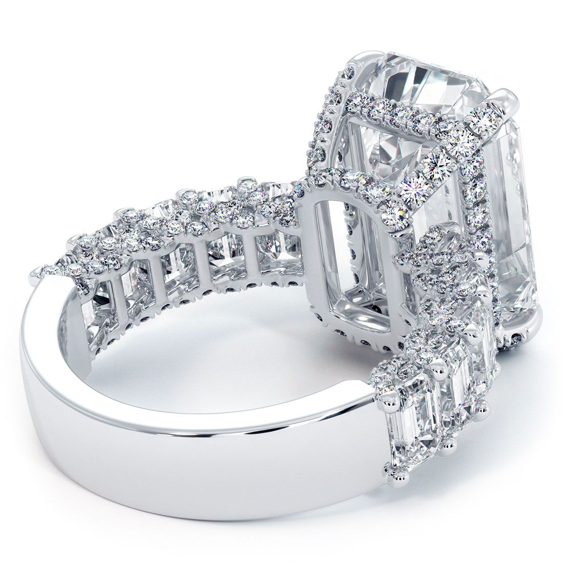 Rear angle showcasing hidden halo and micropavé diamond detail beneath center stone setting, emerald cut ring setting in 18k white gold with 5.12ctw of G color SI1 clarity diamonds, available at Global Sky Diamond, 44 W 47th St Booth GF-10, NYC — view full collection at globalskydiamond.com.