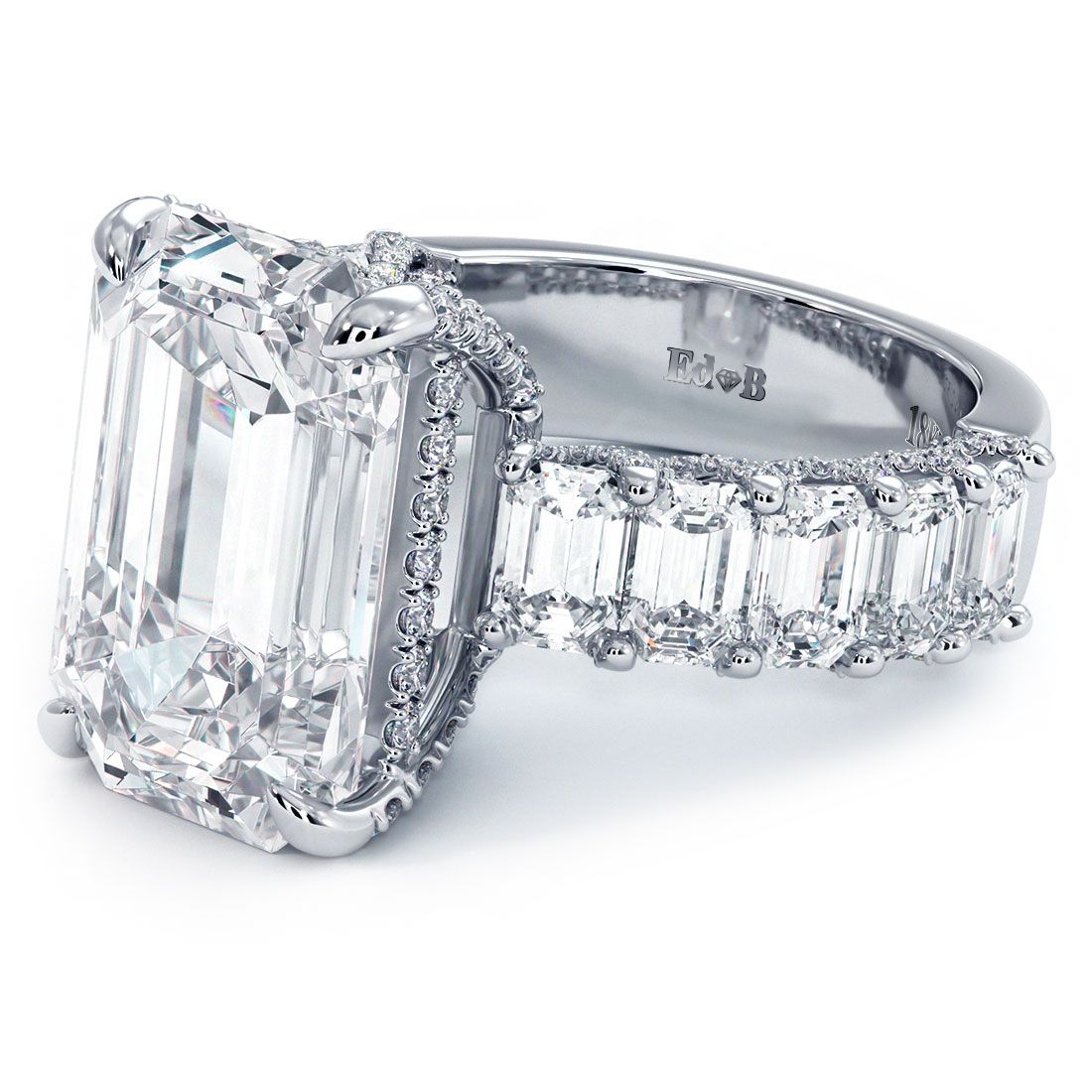 Close-up of emerald cut center setting in platinum-white 18k gold, dazzling micropavé diamond accents totaling 5.12ctw in G color SI1 clarity, designed by Global Sky Diamond, located in Diamond District NYC at 44 W 47th St Booth GF-10 — find your dream ring at globalskydiamond.com.