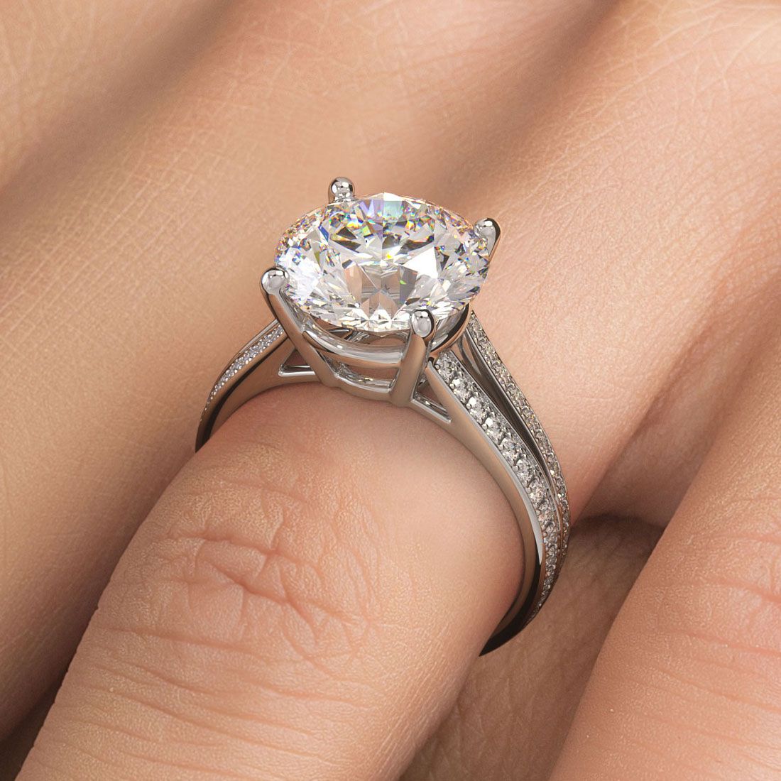 Luxury round basket head engagement ring setting in 18k white gold, featuring dazzling 0.45ctw micropavé diamond split shank, shown on hand in natural light, custom piece by Global Sky Diamonds, 44W 47th St Booth GF-10 NYC — globalskydiamond.com
