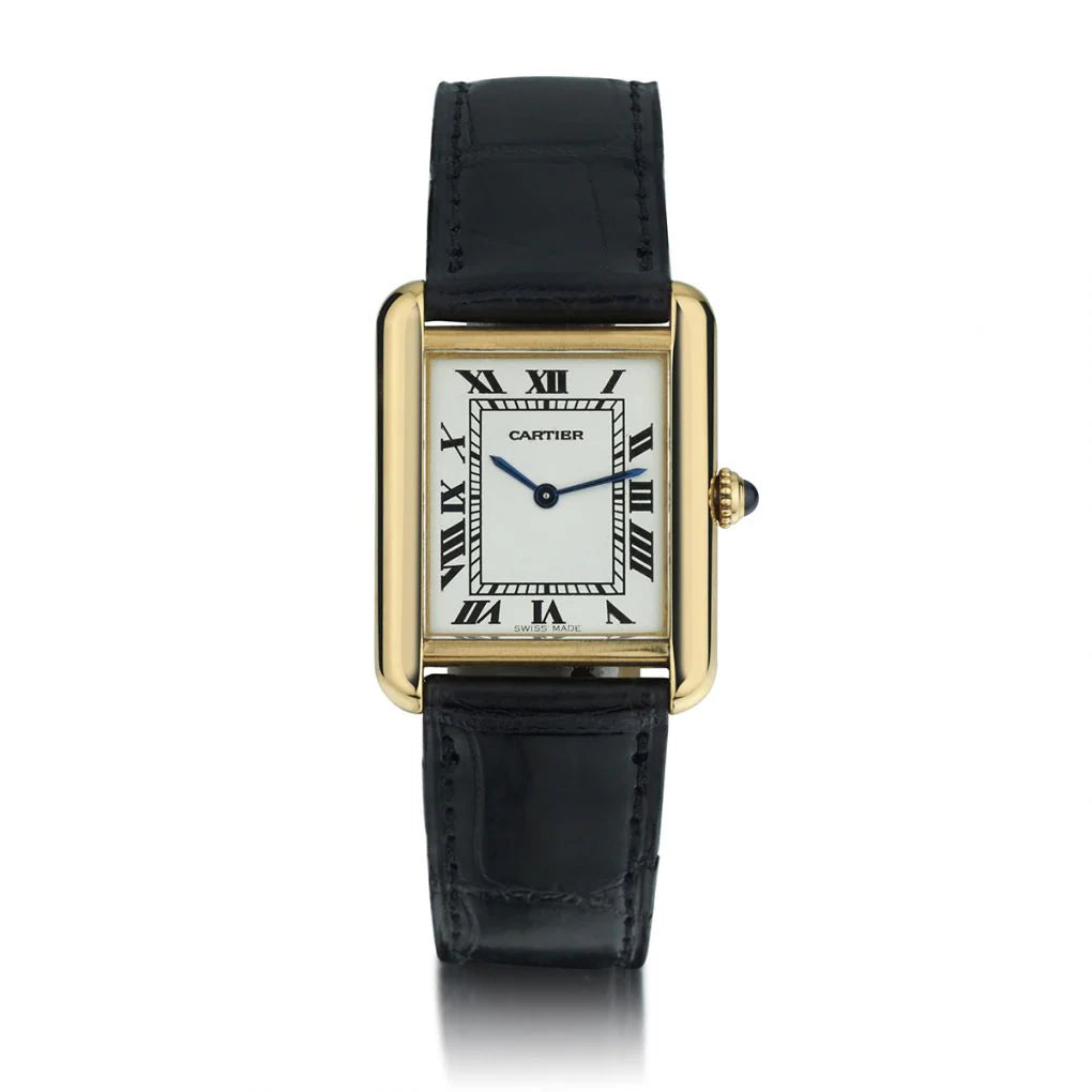 Cartier Tank Solo W5200004 unisex 18kt yellow gold watch with silver opaline dial, Roman numerals, blue hands, and black leather strap – available at globalskydiamond.com, Global Sky Diamonds in NYC Diamond District.