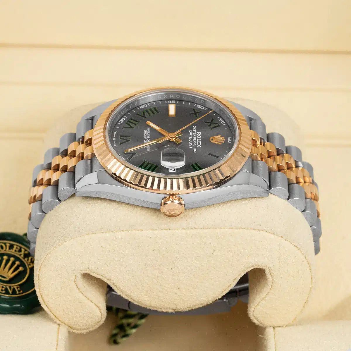 Side profile of pre-owned Rolex Datejust 126331 with 18k yellow gold fluted bezel, stainless steel case, and two-tone bracelet – pristine Rolex Wimbledon dial model with full set at Global Sky Diamonds – globalskydiamond.com