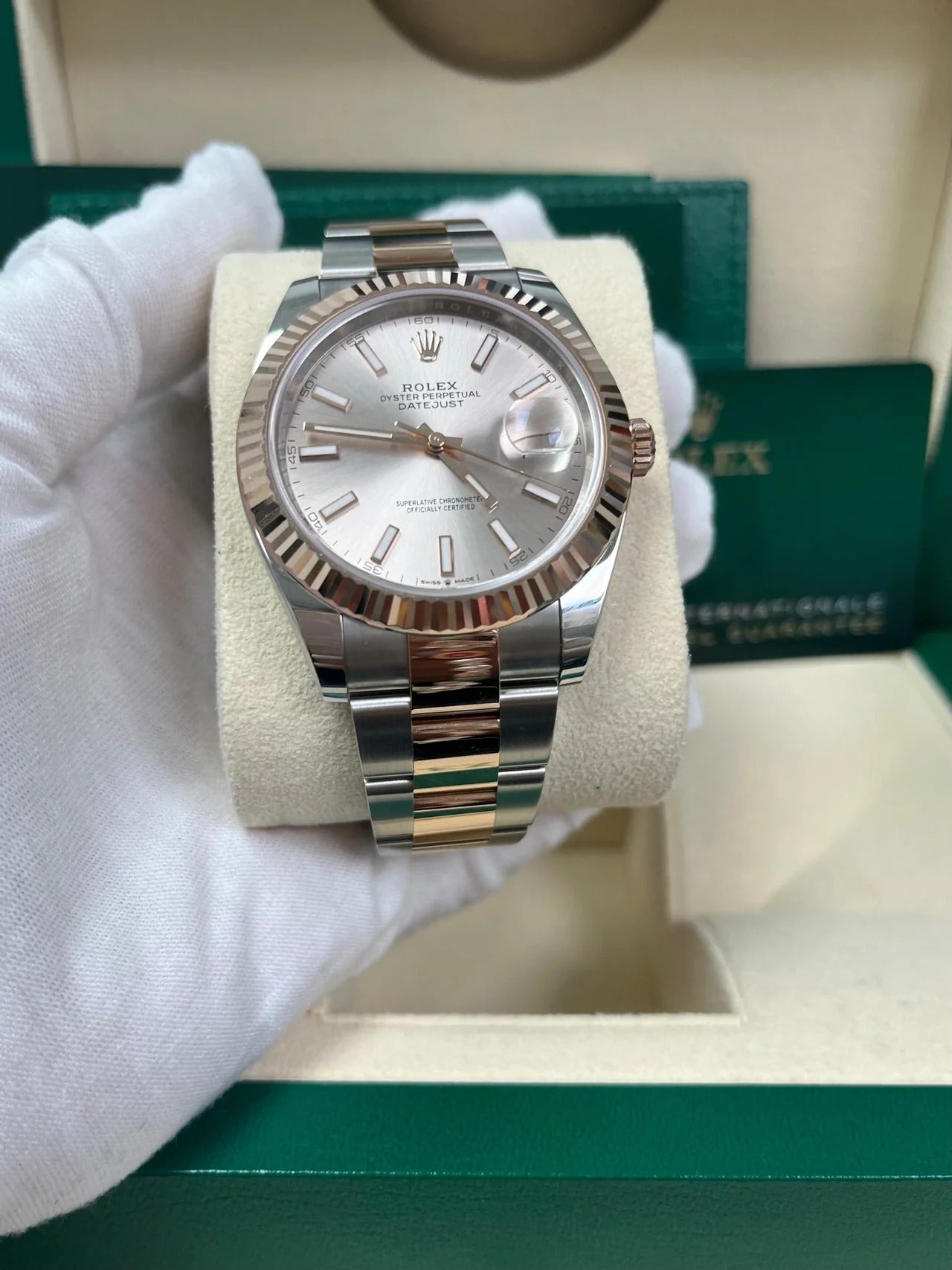 Close-up of Rolex Datejust 126331 Sundust sunray dial with rose gold hour markers and stainless steel case – pre-owned Rolex in mint condition from Global Sky Diamonds – globalskydiamond.com