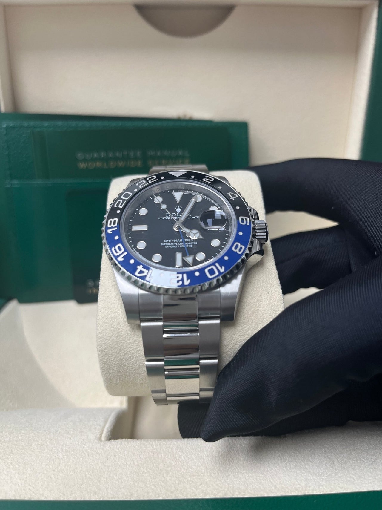 Angled product photo of Rolex GMT-Master II 116710BLNR Batman with black dial and two-tone bezel – 2018 pre-owned Rolex with box and appraisal available for $13,500 – globalskydiamond.com
