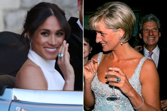 Meghan Markle wearing Princess Diana’s emerald-cut aquamarine cocktail ring, gifted by Prince Harry for the royal wedding reception in 2018.