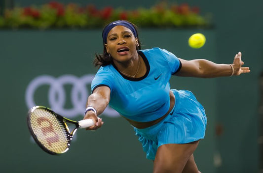Serena Williams wearing a diamond tennis bracelet at the 2022 US Open, honoring the legacy of Chris Evert and redefining sports luxury.