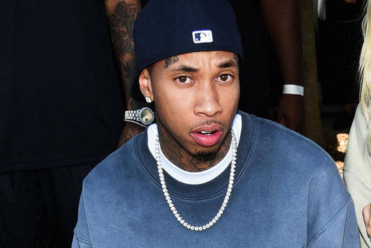 Tyga wearing a bust down Audemars Piguet and Cuban link chain, allegedly at the center of a $500K jewelry lawsuit filed by Avenatti Jewelers.