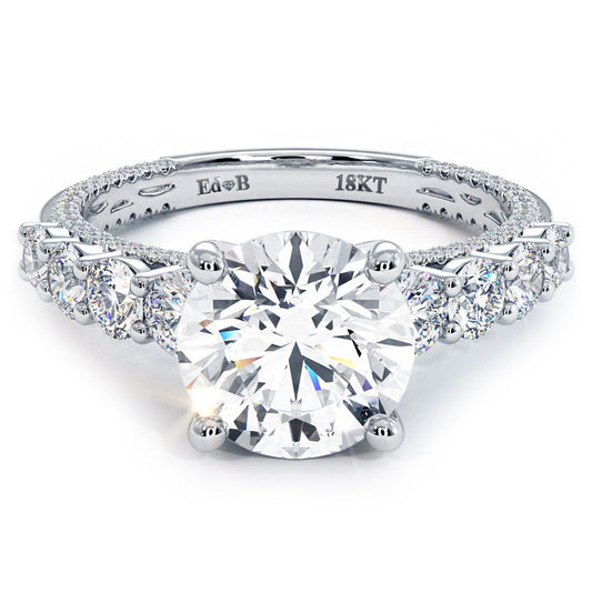 Top view of Round Brilliant diamond engagement ring setting with micropavé and graduated side stones totaling 1.45ctw, crafted in 18k white gold, designed for a 2.0ct round center stone (not included), featuring G color SI1 clarity diamonds, photographed at Global Sky Diamonds, Diamond District NYC, 44W 47th St Booth GF-10. Shop at GlobalSkyDiamond.com.