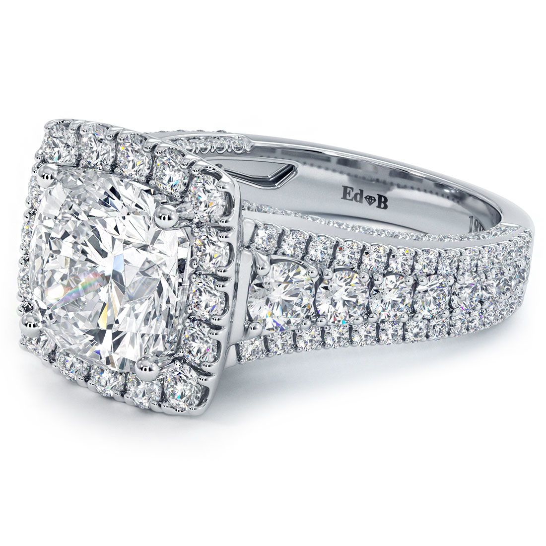 Side profile view of 2.40ctw cushion halo vintage diamond ring in 18k white gold with G color SI1 clarity micropavé side stones; shot at Global Sky Diamonds, 44 W 47th St, Diamond District NYC | globalskydiamond.com
