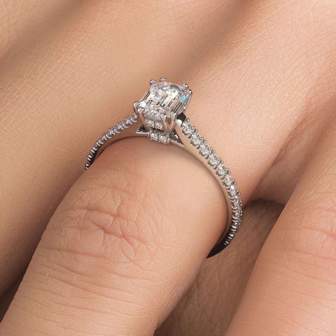 Elegant emerald cut diamond ring setting with double claw prongs, petite micropavé cathedral band and under-head diamonds shown on hand, custom designed by Global Sky Diamonds in New York’s 47th Street Diamond District - Instagram: @globalskydiamonds