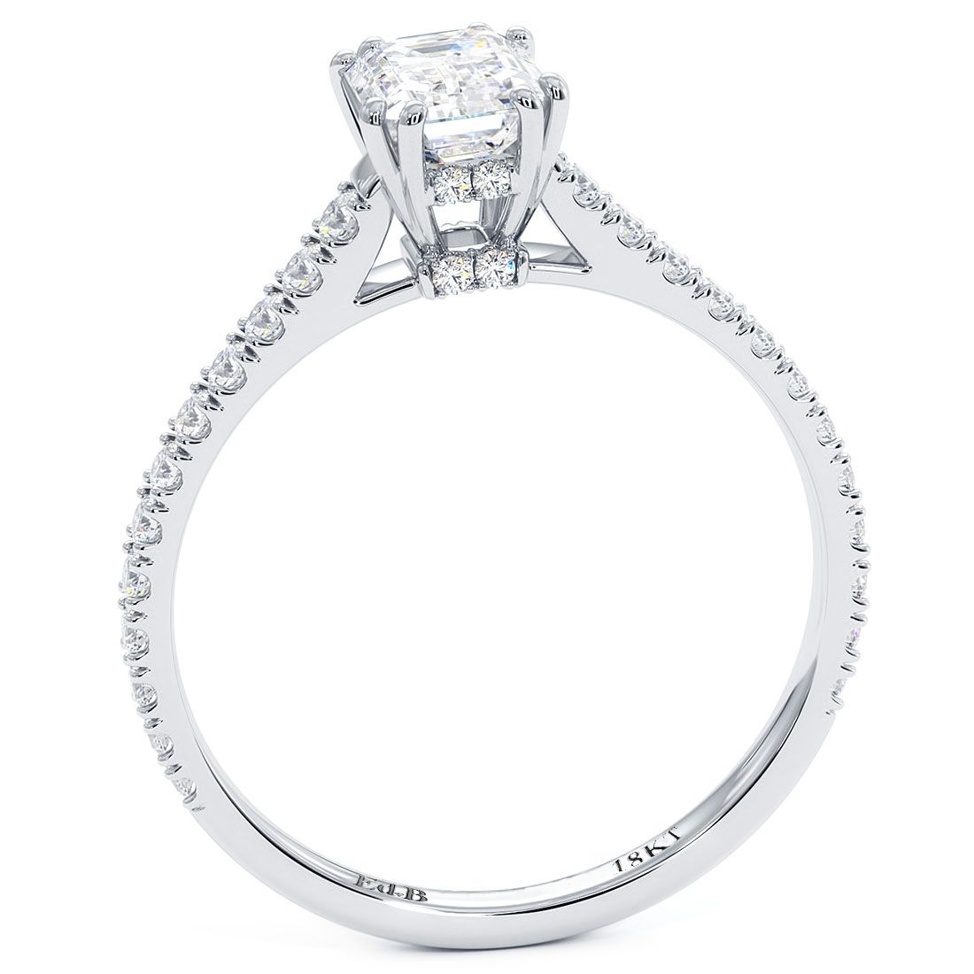 Side view of emerald cut head engagement ring in 18k with diamond accents beneath the head and petite micropavé cathedral shoulders, luxury setting crafted by Global Sky Diamonds in NYC Diamond District, booth GF-10 - global.sky.diamond on TikTok