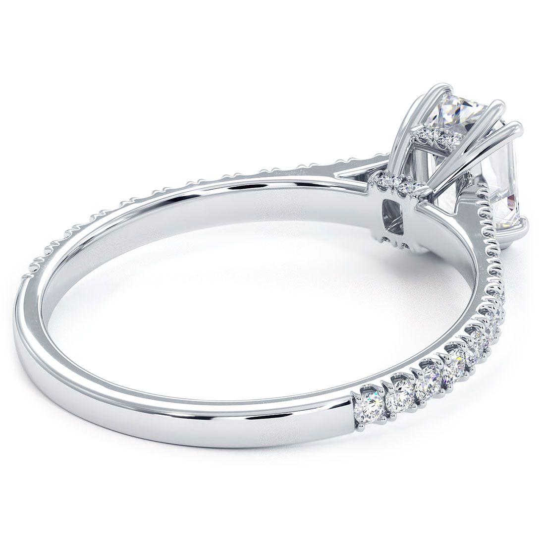 nderside view of custom 18k engagement ring with emerald head, showcasing detailed under-gallery diamonds and double prongs, petite micropavé cathedral shank by Global Sky Diamonds in NYC’s famed Diamond District - follow @globalskydiamonds