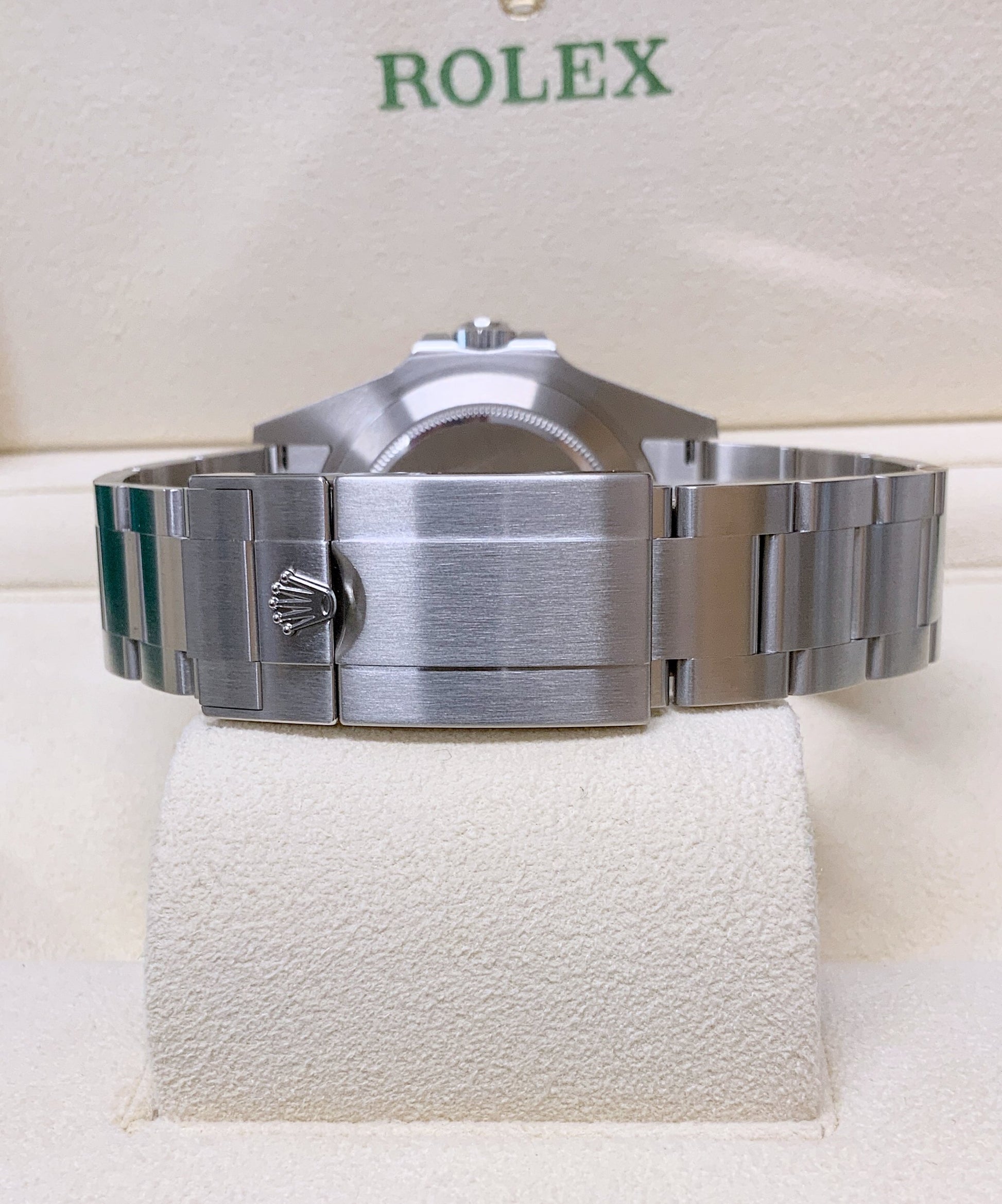 Rolex Explorer II 42mm Polar White Dial Men's Watch 226570 with Oystersteel case and Oyster bracelet, fixed engraved 24-hour bezel, orange GMT hand, Chromalight luminous markers, sapphire crystal with Cyclops lens, automatic Caliber 3285 movement, and Oysterlock clasp—never worn, 100% authentic with original Rolex box and warranty card, available now at Global Sky Diamonds in New York City’s Diamond District at 44 W 47th St Booth GF-10. 3-year warranty included. Shop at globalskydiamond.com.