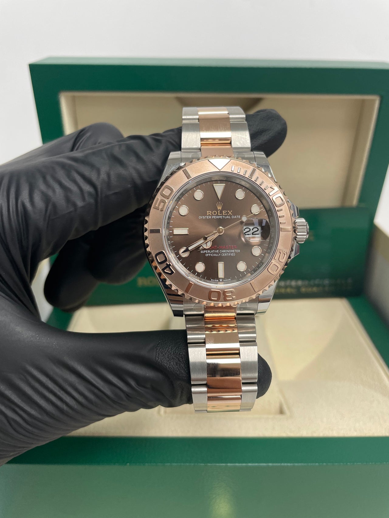 Rolex Yacht-Master 40mm Chocolate Dial Two-Tone Men’s Watch 126621 with 18k Everose gold bezel and center links, Oystersteel case, Oyster bracelet, sunburst chocolate dial, sapphire crystal, and Rolex Caliber 3235 automatic movement—never worn, authentic with box and warranty card. Available now at Global Sky Diamonds, 44 W 47th St Booth GF-10, NYC Diamond District. Shop globalskydiamond.com.